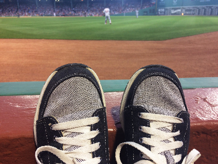 photo of Cindy's sneakers in first row of Fenway Park's left field stands